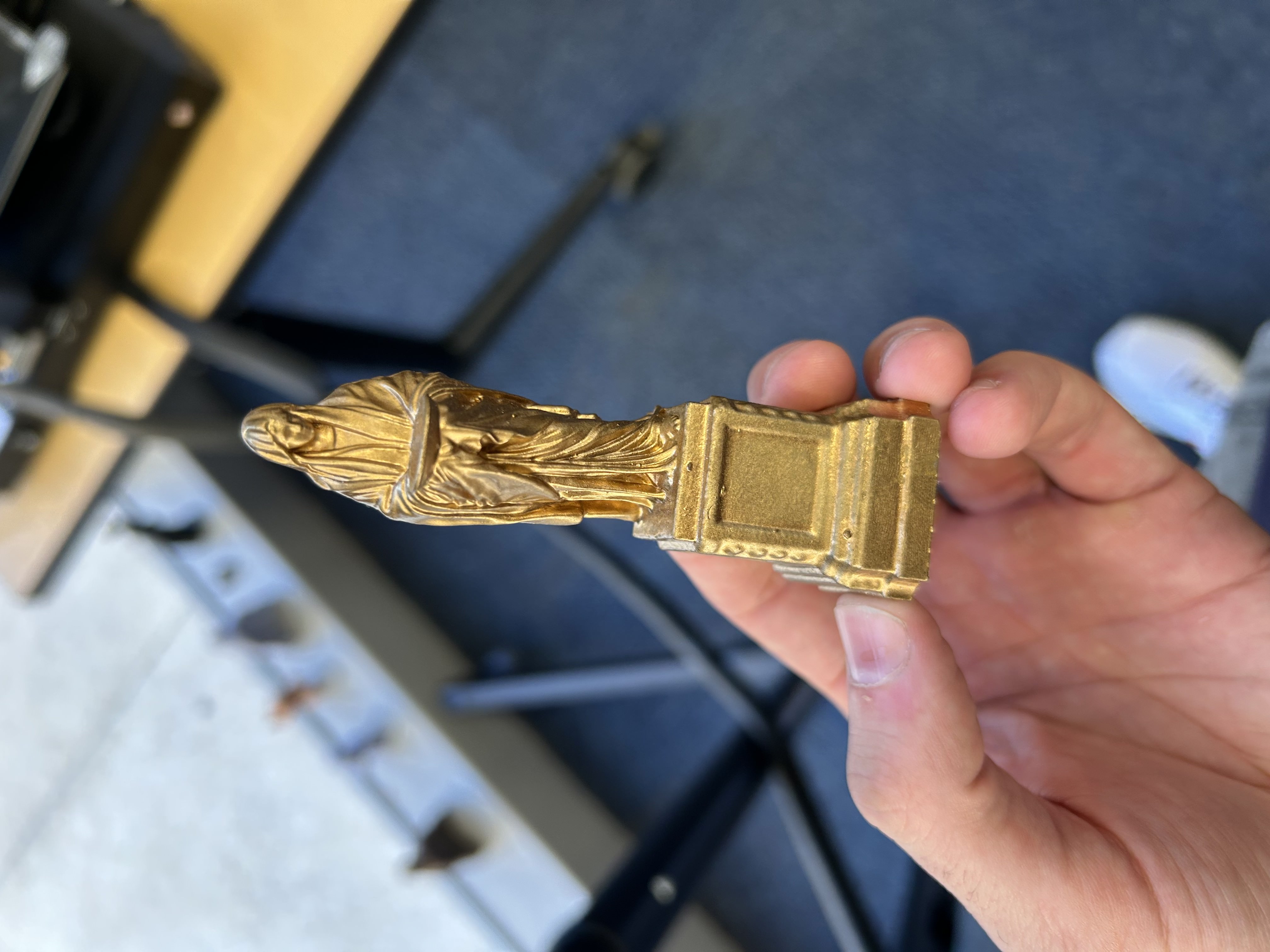 Medusa statue spray painted gold